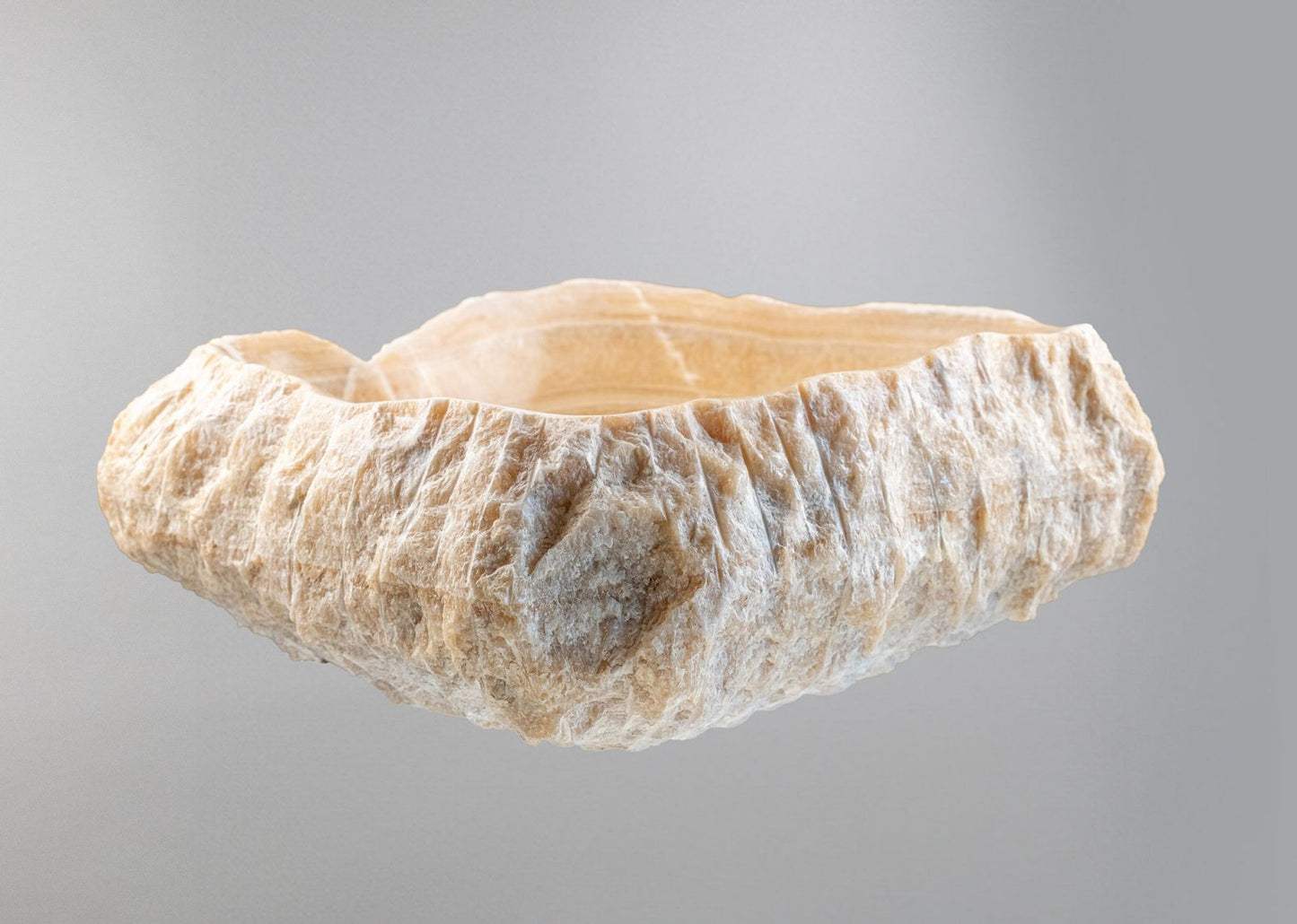 Doğal Oniks Kaya Formu Mermer Lavabo – El Oyma Tezgâh Üstü Doğaltaş Lavabo